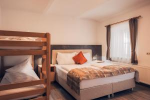 Łóżko lub łóżka w pokoju w obiekcie Ferienwohnung Nassfeld