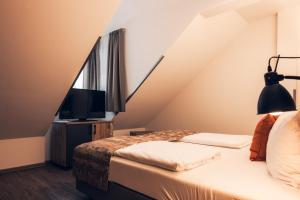 Łóżko lub łóżka w pokoju w obiekcie Ferienwohnung Nassfeld