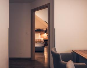 Łóżko lub łóżka w pokoju w obiekcie Ferienwohnung Nassfeld