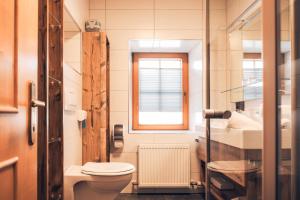 Łazienka w obiekcie Ferienwohnung Nassfeld
