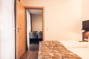 Łóżko lub łóżka w pokoju w obiekcie Ferienwohnung Nassfeld