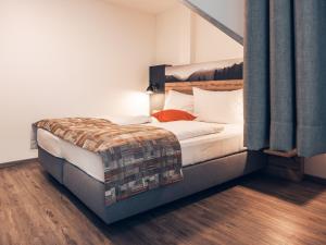 Łóżko lub łóżka w pokoju w obiekcie Ferienwohnung Nassfeld