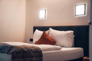 Łóżko lub łóżka w pokoju w obiekcie Ferienwohnung Nassfeld