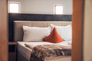 Łóżko lub łóżka w pokoju w obiekcie Ferienwohnung Nassfeld