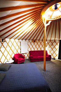 Glamping Dolina客房内的一张或多张床位