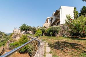 a house on the side of a hill at Casa da Barragem Douro in Cinfães