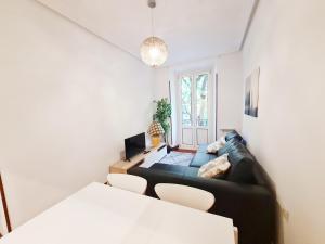 Posteľ alebo postele v izbe v ubytovaní Apartamento Urbieta by SanSe Holidays - Center