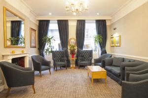 A seating area at Grange Portland Hotel