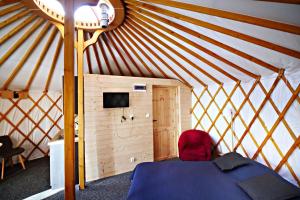 Glamping Dolina客房内的一张或多张床位