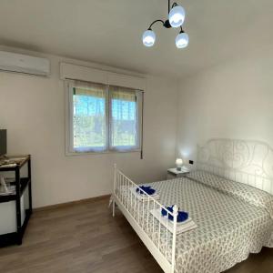Posteľ alebo postele v izbe v ubytovaní Agriturismo Corte Filippi