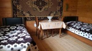 Letto o letti in una camera di VARD-CIKHE
