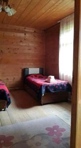 Letto o letti in una camera di VARD-CIKHE