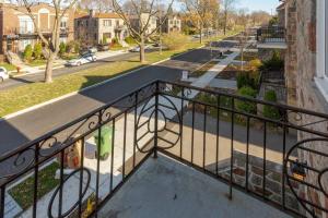 a balcony with a view of a street at Free Parking, Beautiful 4 1/2-2 BR apartment in Montreal
