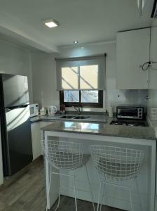 メンドーサにあるUMMA Mendozaのキッチン(カウンター、コンロ付) トップオーブン