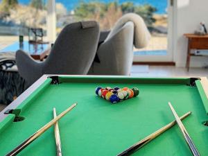 a pool table with cue balls on top of it at 10 person holiday home in Asn s in Asnæs
