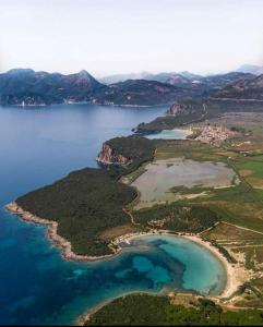 an aerial view of a group of islands in the water at Georgiadis House in Ammoudia