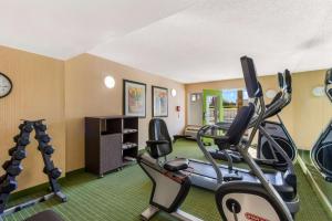 a fitness room with treadmills and elliptical machines at SureStay Plus Hotel by Best Western Scottsdale North in Scottsdale