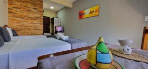 Uma cama ou camas num quarto em Hotel Pousada Sol & Lua