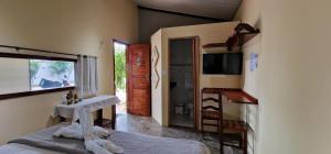 Uma cama ou camas num quarto em Hotel Pousada Sol & Lua