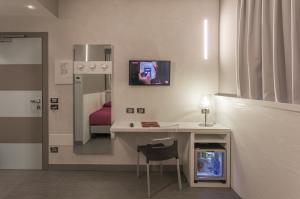 TV a/nebo společenská místnost v ubytování Hotel Doge