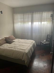 Postel nebo postele na pokoji v ubytování Violeta Plaza