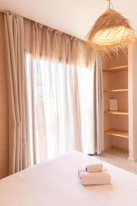 Кровать или кровати в номере Surf&Sound Hotel