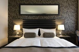 Postel nebo postele na pokoji v ubytování Park Hotel am Berliner Tor