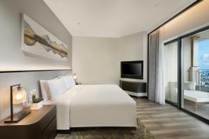 TV o dispositivi per l'intrattenimento presso Oakwood Residence Foshan