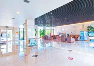 Posezení v ubytování Le Premier Hotel Deltamas