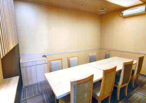 Posezení v ubytování Le Premier Hotel Deltamas