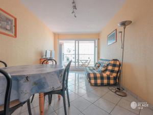 Posedenie v ubytovaní Appartement plage et commerces, balcon, tout confort - FR-1-197-547