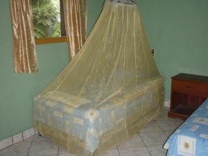 Cama o camas de una habitación en Guest house Posada Ixchel