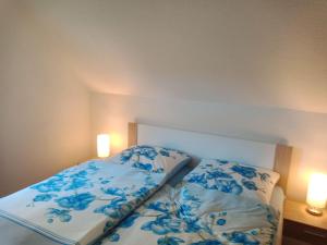 Ένα ή περισσότερα κρεβάτια σε δωμάτιο στο Ferienwohnung-Rothen-Adler