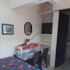 TV a/nebo společenská místnost v ubytování B&B KeisyAlba Punta Rucia + 37 fotografií