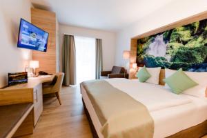 Postelja oz. postelje v sobi nastanitve R&R Residenzen HOTEL