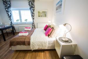 Letto o letti in una camera di Bled Apartments