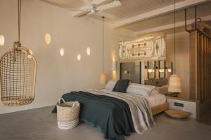 A bed or beds in a room at Yacht Boheme Hotel-Boutique Class - Adults Only