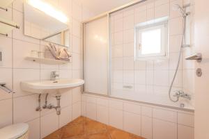 Kúpeľňa v ubytovaní Chalet Georg