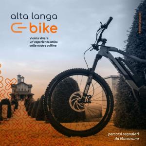 a bike parked in front of a picture at La Tana dello Scoiattolo - Adults Only in Murazzano