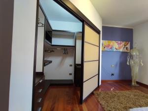 A bed or beds in a room at Appartamento Incantevole La Coccola