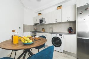 Kuchyň nebo kuchyňský kout v ubytování Home2Book Design Cool Center Apt Las Palmas