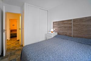 Posteľ alebo postele v izbe v ubytovaní Apartamento Torresol #