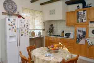 Kuchyň nebo kuchyňský kout v ubytování Casal Santo Antonio