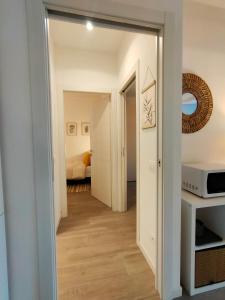 A bed or beds in a room at Valtellina Vacanze