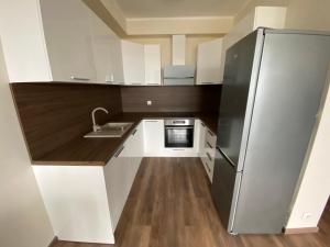Kuchyň nebo kuchyňský kout v ubytování Boutique Apartment - 44 m2 - great location