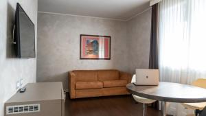 TV a/nebo společenská místnost v ubytování CAVALLO Hotel Noventa di Piave