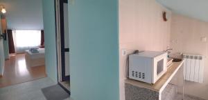 Postel nebo postele na pokoji v ubytování Hotel Bobchev