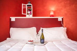 Postel nebo postele na pokoji v ubytování Hotel Oceanomare