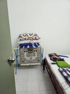 Katil atau katil-katil dalam bilik di D'Haja 61 KLIA Sepang with 3 AIRCONDS & WiFi +7 gambar
