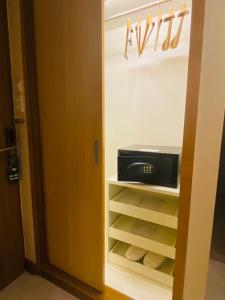 TV a/nebo společenská místnost v ubytování Rimkhobfa Urban Resort